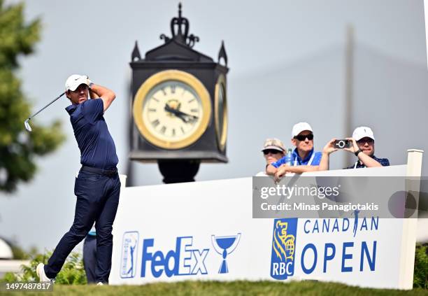 Rory McIlroy of Northern Ireland hits his first shot on the 1th hole during the third round of the RBC Canadian Open at Oakdale Golf & Country Club...