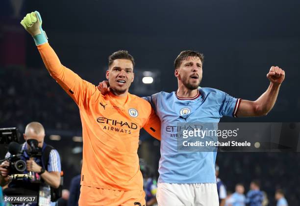 Ederson and Ruben Dias of Manchester City celebrate after the team's victory in the UEFA Champions League 2022/23 final match between FC...