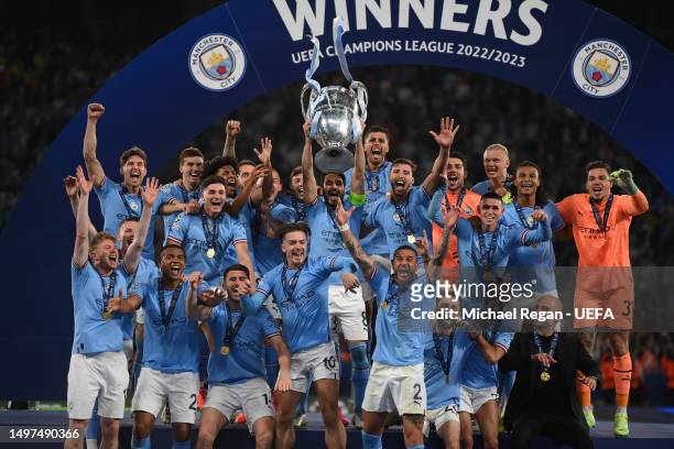 Lkay Guendogan of Manchester City lifts the UEFA Champions League trophy after the team's victory during the UEFA Champions League 2022/23 final...