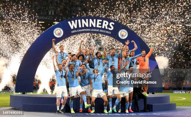 Ilkay Guendogan of Manchester City lifts the UEFA Champions League trophy after the team's victory during the UEFA Champions League 2022/23 final...