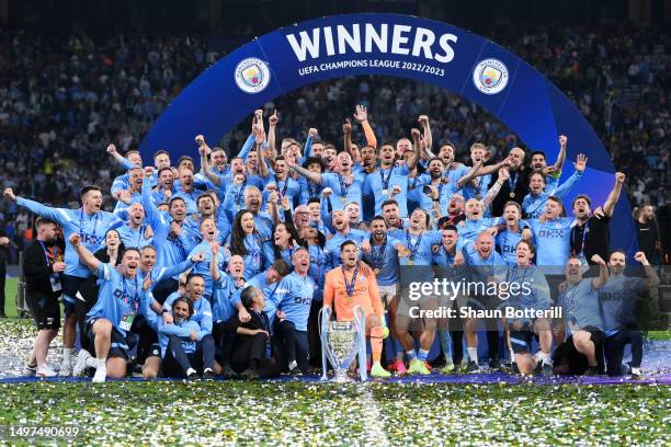 Manchester City players and staff celebrate with the UEFA Champions League trophy after the team's victory in the UEFA Champions League 2022/23 final...