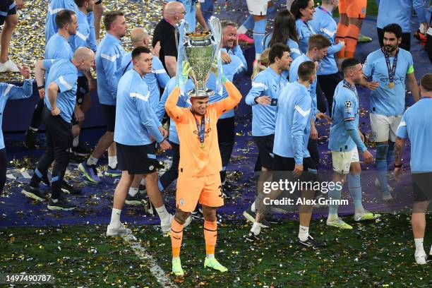 Ederson of Manchester City celebrates with the UEFA Champions League trophy after the team's victory during the UEFA Champions League 2022/23 final...