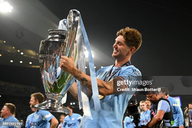 John Stones of Manchester City celebrates with the UEFA Champions League trophy after the team's victory in the UEFA Champions League 2022/23 final...