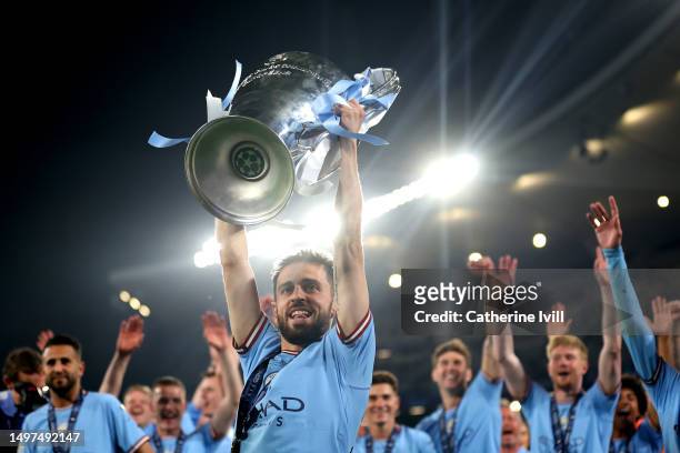 Bernardo Silva of Manchester City celebrates with the UEFA Champions League trophy after the team's victory during the UEFA Champions League 2022/23...