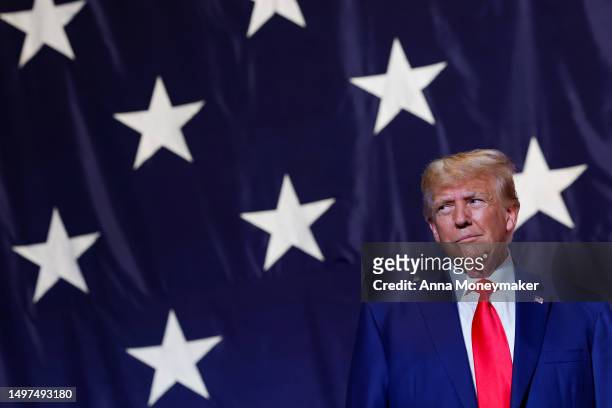 Former U.S. President Donald Trump arrives to deliver remarks to the Georgia state GOP convention at the Columbus Convention and Trade Center on June...