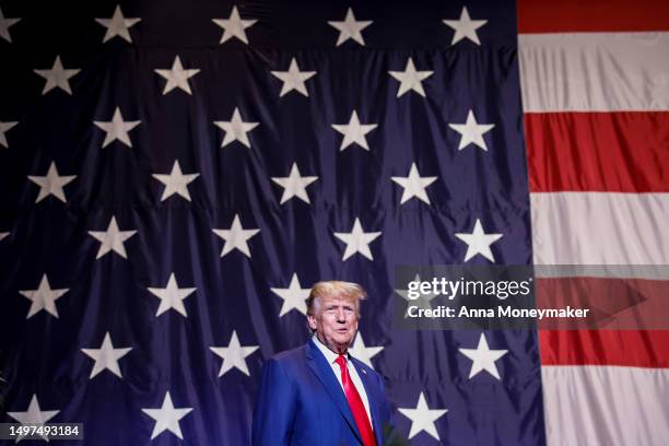 Former U.S. President Donald Trump arrives to deliver remarks to the Georgia state GOP convention at the Columbus Convention and Trade Center on June...