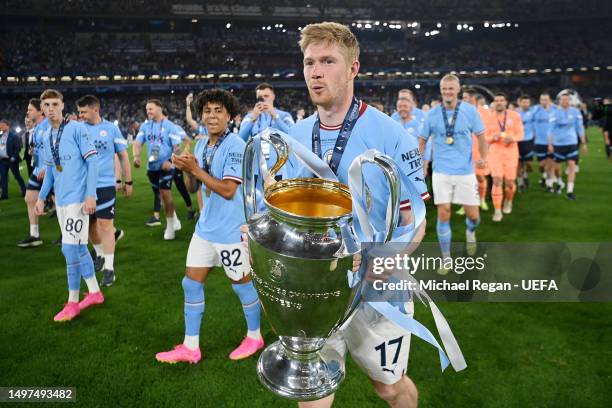 Kevin De Bruyne of Manchester City celebrates with the UEFA Champions League trophy after the team's victory during the UEFA Champions League 2022/23...