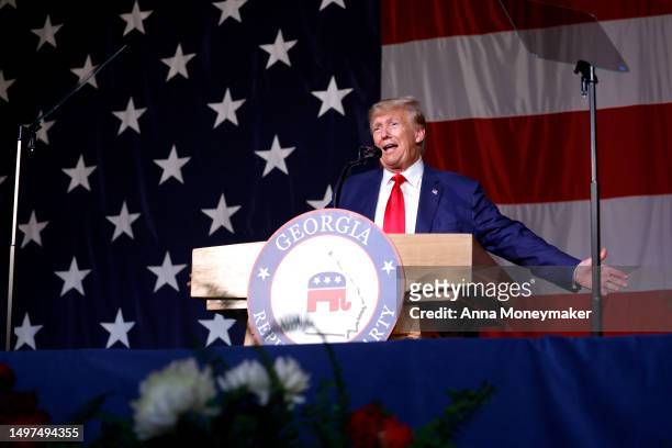 Former U.S. President Donald Trump delivers remarks during the Georgia state GOP convention at the Columbus Convention and Trade Center on June 10,...