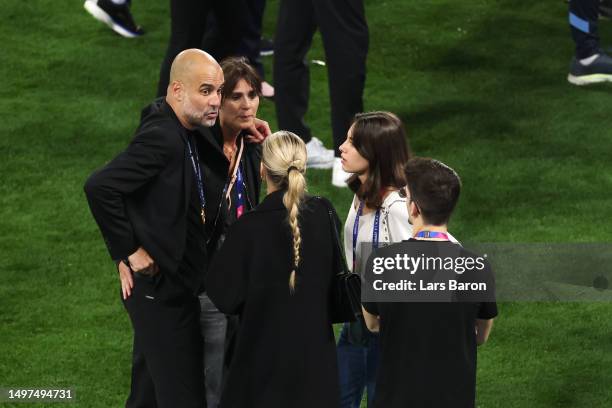 Pep Guardiola, Manager of Manchester City, celebrates with his wife Cristina Serra after the team's victory during the UEFA Champions League 2022/23...
