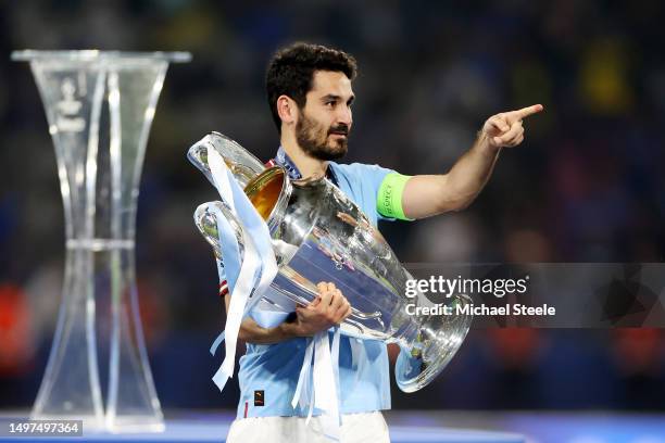 Ilkay Guendogan of Manchester City celebrates with the UEFA Champions League trophy after the team's victory after the team's victory in the UEFA...