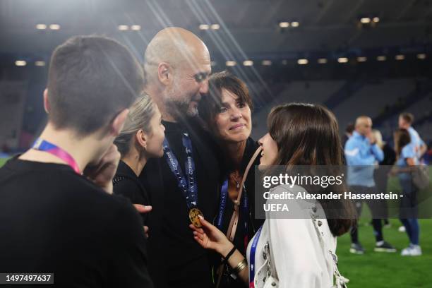 Pep Guardiola, Manager of Manchester City, celebrates with his wife Cristina Serra and his daughter Maria Guardiola after the team's victory in the...