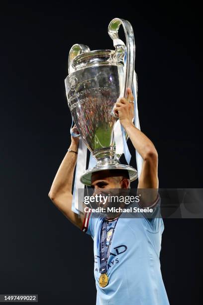 Riyad Mahrez of Manchester City celebrates with the UEFA Champions League trophy after the team's victory during the UEFA Champions League 2022/23...