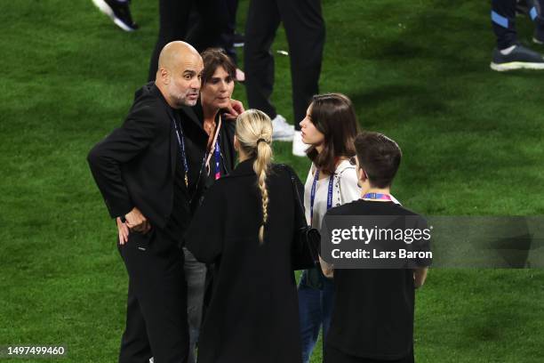 Pep Guardiola, Manager of Manchester City, celebrates with his wife Cristina Serra after the team's victory during the UEFA Champions League 2022/23...