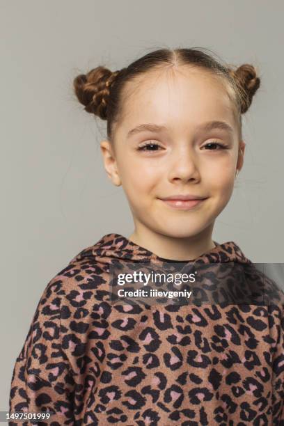 blonde girl in studio on white background. child. childhood. summer fashion. hair bun hairstyle - preteen girl models stock pictures, royalty-free photos & images