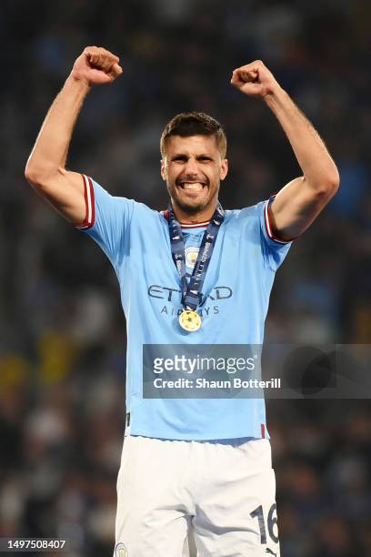 Rodri of Manchester City celebrates while wearing his winners medal after the team's victory in the UEFA Champions League 2022/23 final match between...