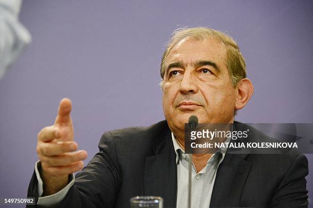 Syrian deputy premier for economic affairs and minister of domestic trade and consumer protection Qadri Jamil gestures during a press conference in...