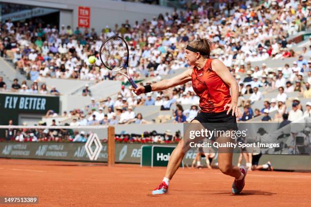 Karolina Muchova of Czech Republic returns a ball against Iga Swiatek of Poland during the Women's Singles Final match on Day Fourteen of the 2023...