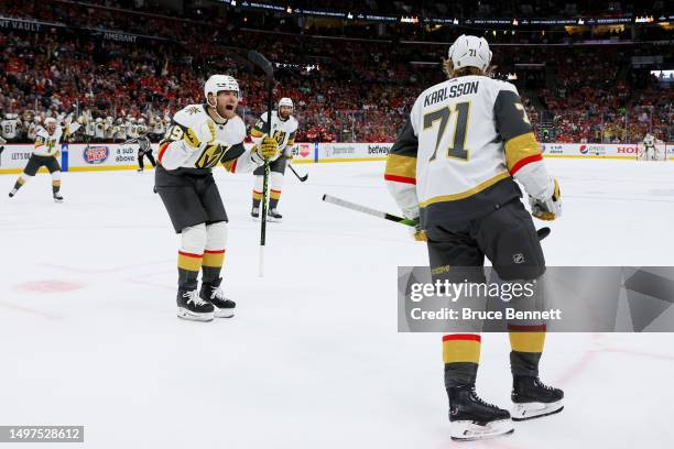 William Karlsson of the Vegas Golden Knights is congratulated by Ivan Barbashev after scoring a goal against the Florida Panthers during the second...
