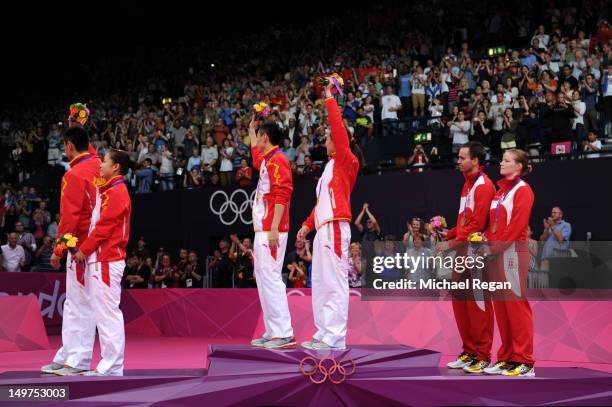 Silver medallists Chen Xu and Jin Ma of China, Gold medallists Nan Zhang and Yunlei Zhao of China and Bronze medallists Joachim Fischer and...