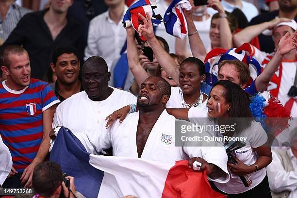 Teddy Riner of France celebrates his gold medal in the Men's +100 kg Judo on Day 7 of the London 2012 Olympic Games at ExCeL on August 3, 2012 in...