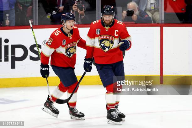Aleksander Barkov of the Florida Panthers is congratulated by Anton Lundell after scoring a goal against the Vegas Golden Knights during the third...