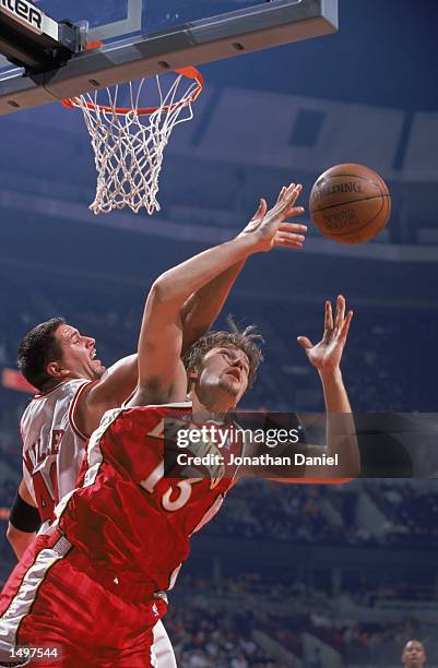 Forward Hanno Mottola of the Atlanta Hawks battles for the ball during the NBA game against the Chicago Bulls at the United Center in Chicago,...