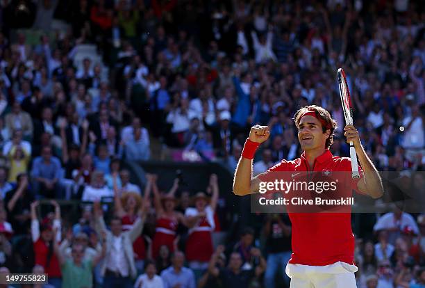 Roger Federer of Switzerland celebrates his 4-6, 7-6, 19-17 win over Juan Martin Del Potro of Argentina in the Semifinal of Men's Singles Tennis on...