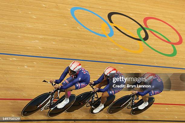 Sarah Hammer, Dotsie Bausch and Jennie Reed of the United States compete in the Women's Team Pursuit Track Cycling qualifying on Day 7 of the London...