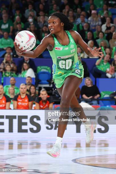 Sunday Aryang of the Fever reaches for the ball during the round 13 Super Netball match between West Coast Fever and Giants Netball at RAC Arena, on...