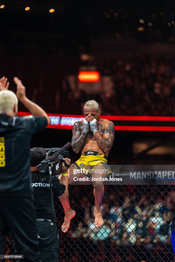 Darius Rafii Charles Oliveira gets emotional after his victory over Beneil Dariush ...