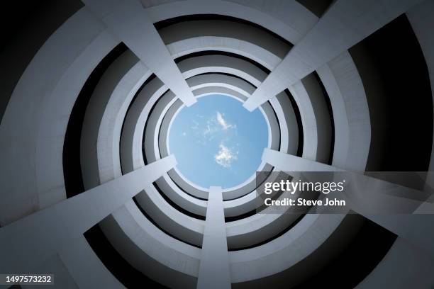 rotary lane in multi-storey parking lot - mortar rounds stock pictures, royalty-free photos & images