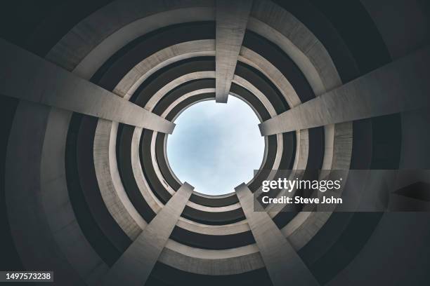rotary lane in multi-storey parking lot - mortar rounds stock pictures, royalty-free photos & images