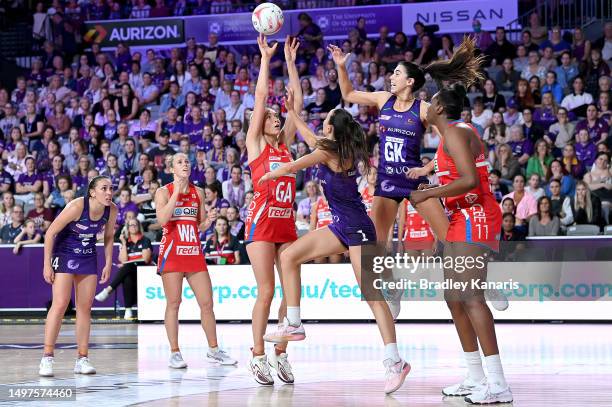 Helen Housby of the Swifts shoots during the round 13 Super Netball match between Queensland Firebirds and NSW Swifts at Nissan Arena, on June 11 in...