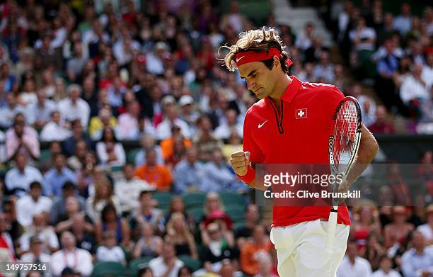 Roger Federer of Switzerland celebrates a point against Juan Martin Del Potro of Argentina in the Semifinal of Men's Singles Tennis on Day 7 of the...