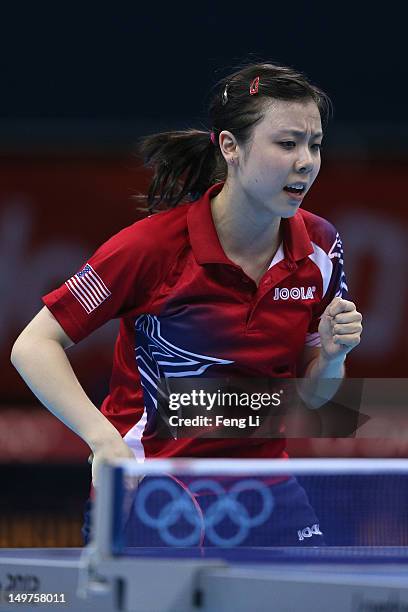 Ariel Hsing of United States celebrates during Women's Team Table Tennis first round match against team of Japan on Day 7 of the London 2012 Olympic...