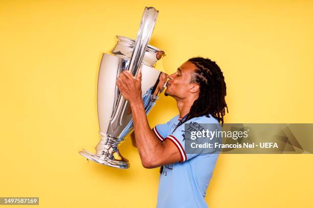 Nathan Ake of Manchester City poses with the UEFA Champions League Trophy after the UEFA Champions League 2022/23 final match between FC...