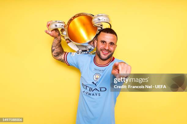 Kyle Walker of Manchester City poses with the UEFA Champions League Trophy after the UEFA Champions League 2022/23 final match between FC...