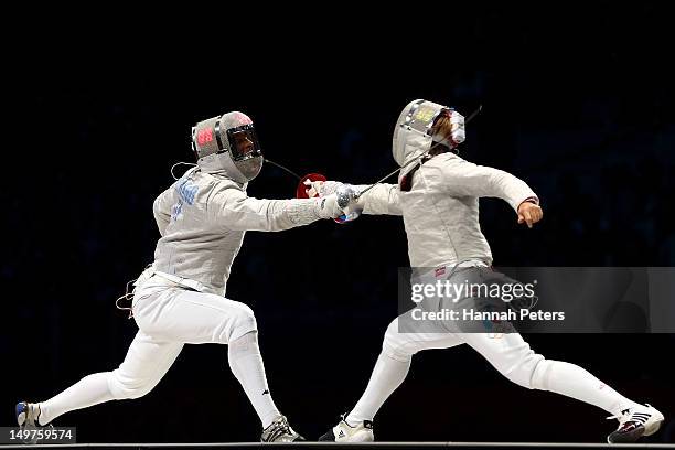Aldo Montano of Italy competes against Nikolay Kovalev of Russia during the Men's Sabre Team Fencing on Day 7 of the London 2012 Olympic Games at...
