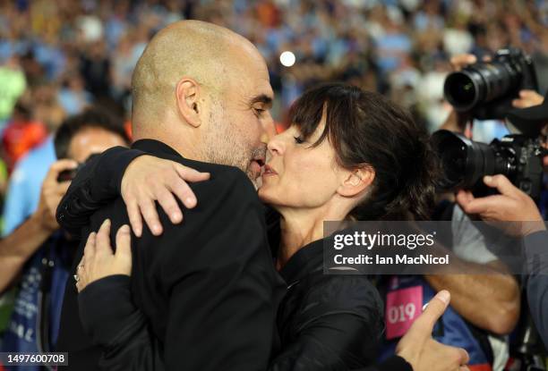 Manchester City manager Pep Guardiola’s kisses his wife Cristina Serra after winning the UEFA Champions League 2022/23 final match between FC...