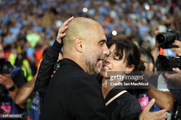 Manchester City manager Pep Guardiola’s kisses his wife Cristina Serra after winning the UEFA Champions League 2022/23 final match between FC...