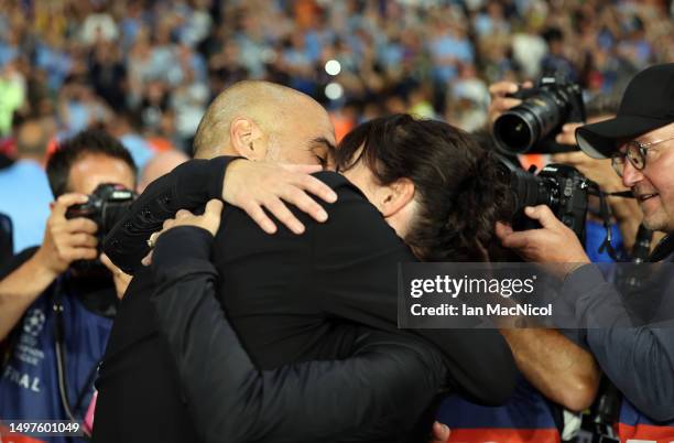 Manchester City manager Pep Guardiola’s kisses his wife Cristina Serra after winning the UEFA Champions League 2022/23 final match between FC...