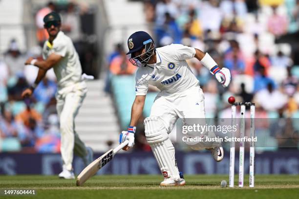 Ajinkya Rahane of India grounds their bat inside the crease after making a quick run during day five of the ICC World Test Championship Final between...