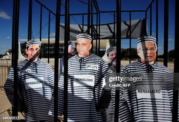 Images of Brazilian politicians Jose Dirceu , Marcos Valerio , Joao Paulo Cunha and Delubio Soares , some of the defendants in the trial known as...