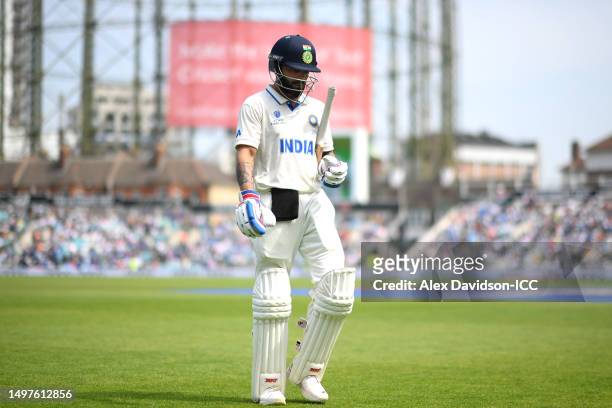 Virat Kohli of India walks off after being dismissed by Scott Boland of Australia during day five of the ICC World Test Championship Final between...