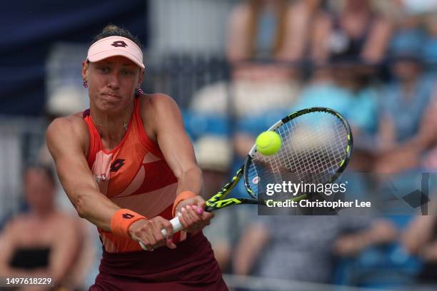 Yanina Wickmayer of Belgium in action against Katie Swan of Great Britain during the Lexus Surbiton Trophy Womens Final at Surbiton Racket & Fitness...