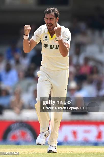 Mitchell Starc of Australia celebrates the wicket of Ajinkya Rahane of India during day five of the ICC World Test Championship Final between...