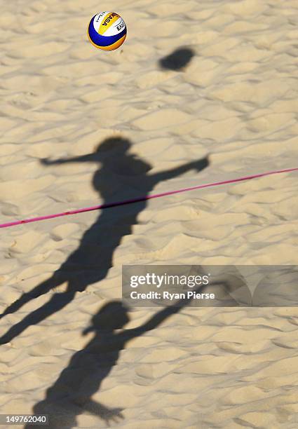 Phil Dalhausser of the United States and Todd Rogers of the United States warm up before the Men's Beach Volleyball Round of 16 match between United...