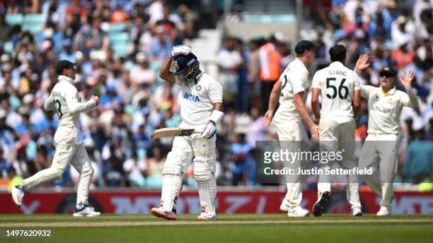 Ajinkya Rahane of India walks off after being dismissed by Mitchell Starc of Australia during day five of the ICC World Test Championship Final...