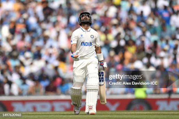 Ajinkya Rahane of India walks off after being dismissed by Mitchell Starc of Australia during day five of the ICC World Test Championship Final...