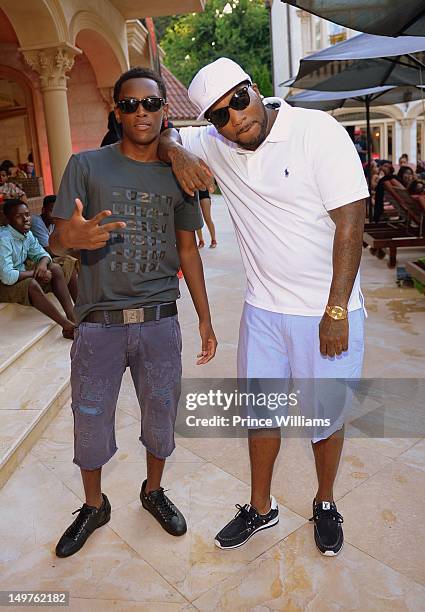 Jadarius Jenkins and Young Jeezy attend the sweet 16 birthday party for Young Jeezy's son Jadarius Jenkins on July 29, 2012 in Atlanta, Georgia.